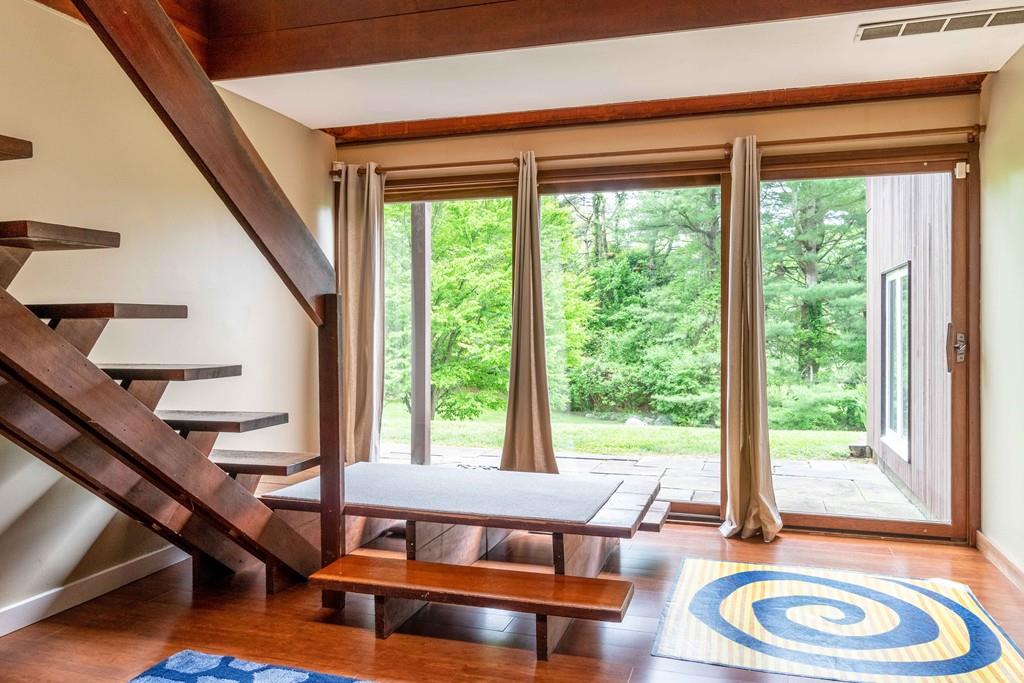 67 Conant Road Lincoln, MA 01773 - Photo 28 of 38 a living room with furniture and a window