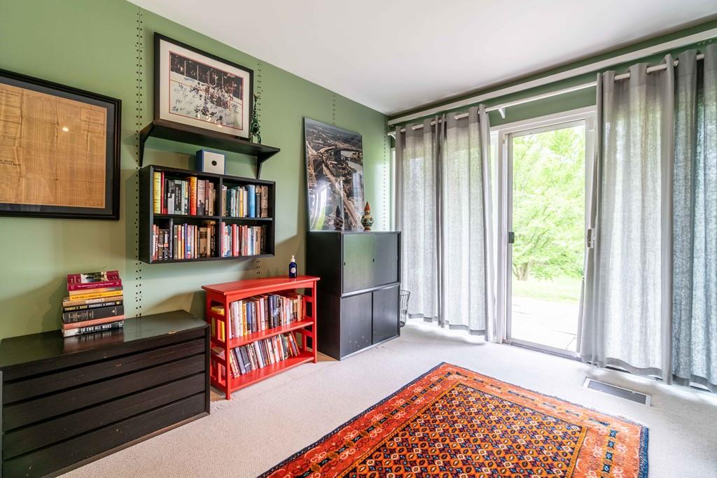 67 Conant Road Lincoln, MA 01773 - Photo 31 of 38 a bedroom with furniture and a window