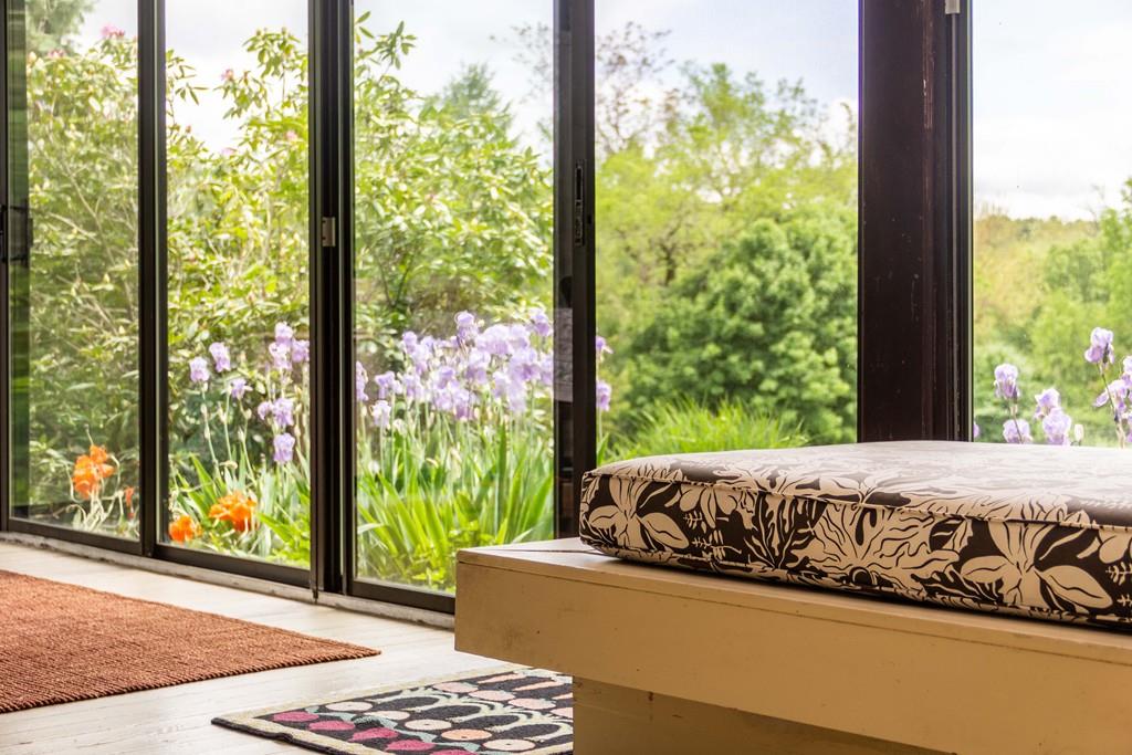 67 Conant Road Lincoln, MA 01773 - Photo 38 of 38 a living room with couch and a large window