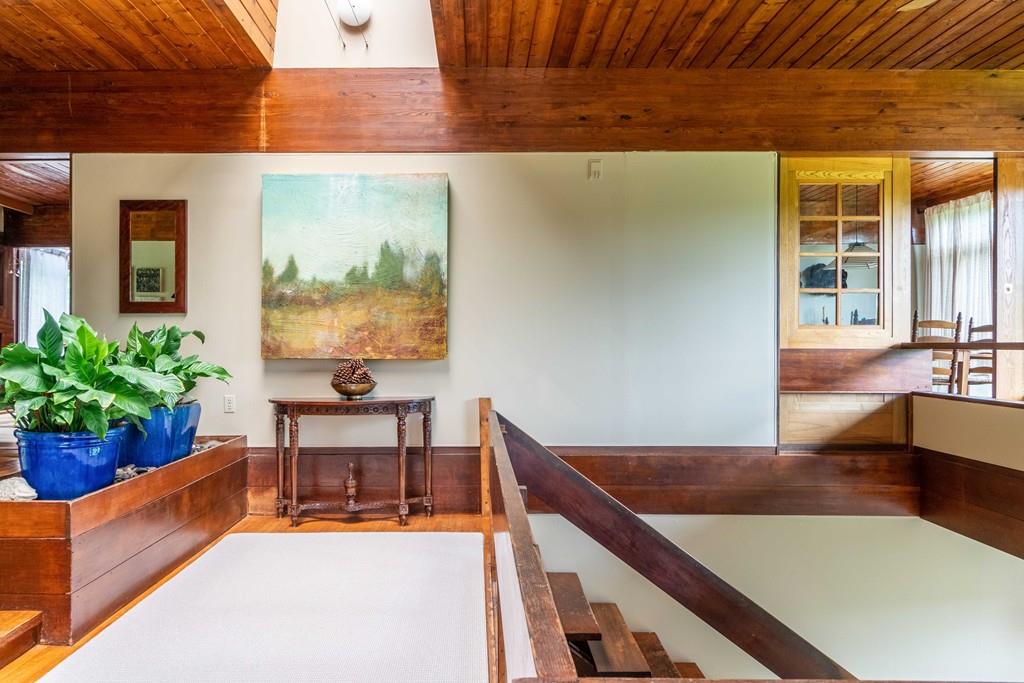 67 Conant Road Lincoln, MA 01773 - Photo 9 of 38 a living room with furniture and a potted plant