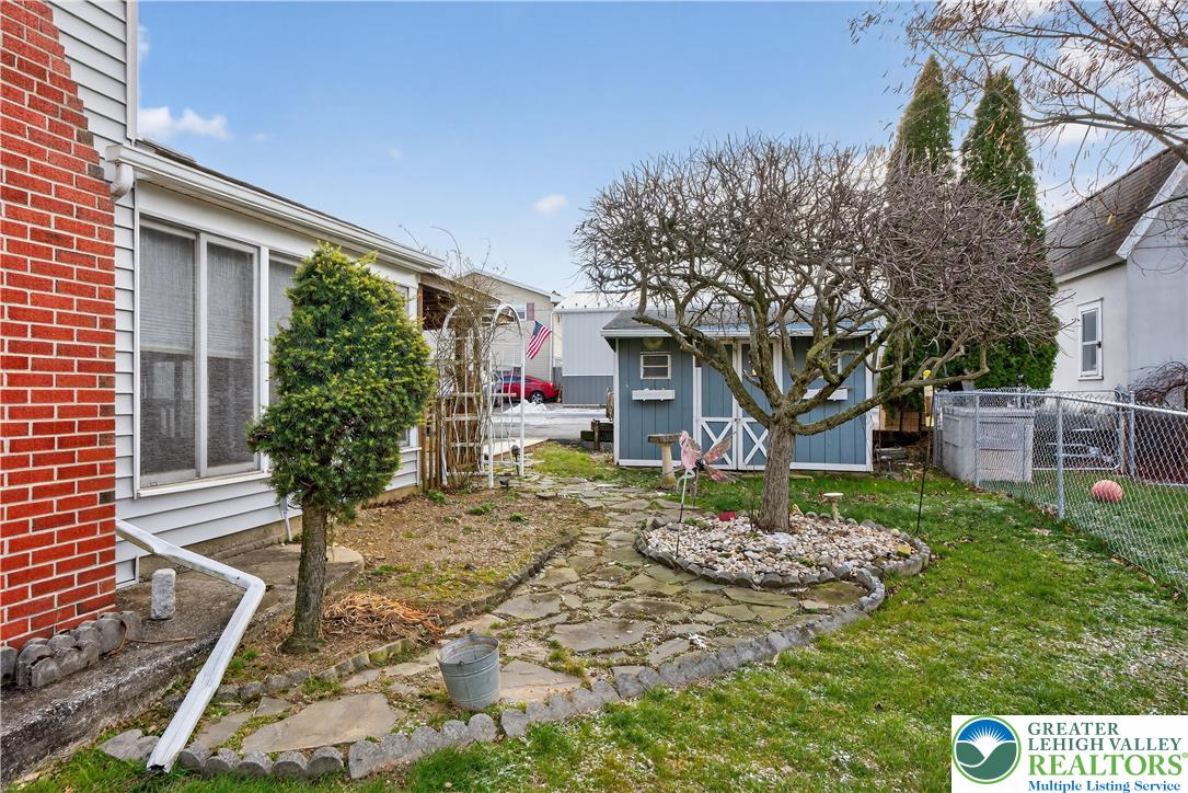 108 West 2nd Street Alburtis, PA 18011 - Photo 22 of 24 a front view of a house with garden