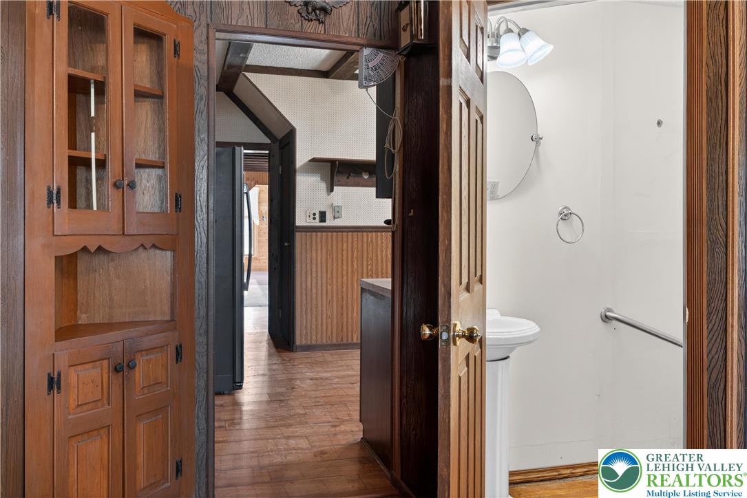 108 West 2nd Street Alburtis, PA 18011 - Photo 5 of 24 a view of a hallway with wooden floor and staircase