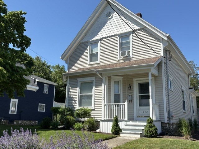 1012 Washington Street Whitman, MA 02382 - Photo 2 of 37 a view of a house with a yard and plants