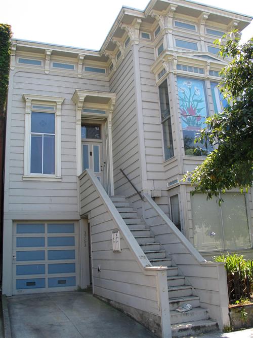 FRONT OF GREAT THREE-UNIT VICTORIAN BUILDING IN THE CASTRO.