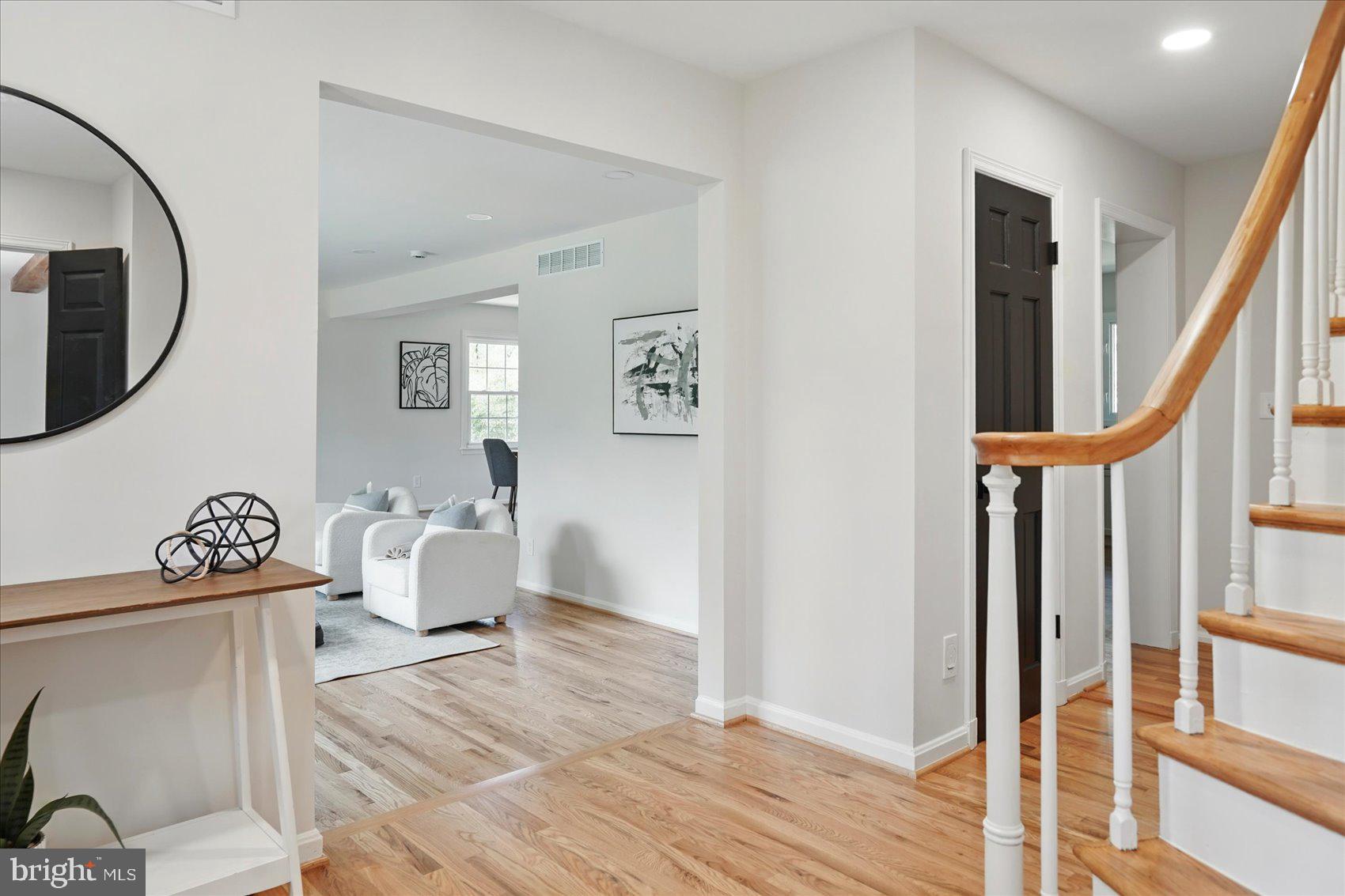 1504 Ameshire Road Lutherville-Timonium, MD 21093 - Photo 19 of 54 a living room with furniture and a mirror
