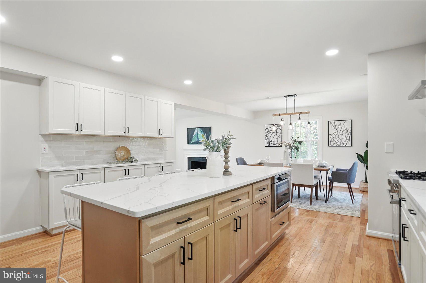1504 Ameshire Road Lutherville-Timonium, MD 21093 - Photo 26 of 54 a kitchen with a sink a counter top space and stainless steel appliances