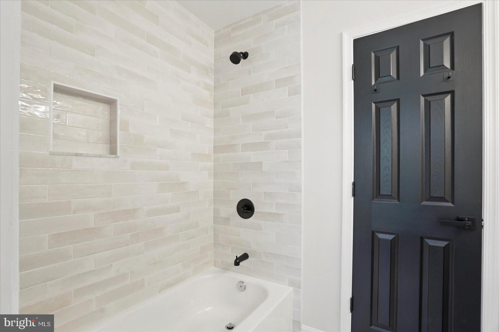 1504 Ameshire Road Lutherville-Timonium, MD 21093 - Photo 31 of 54 a bathroom with a tub