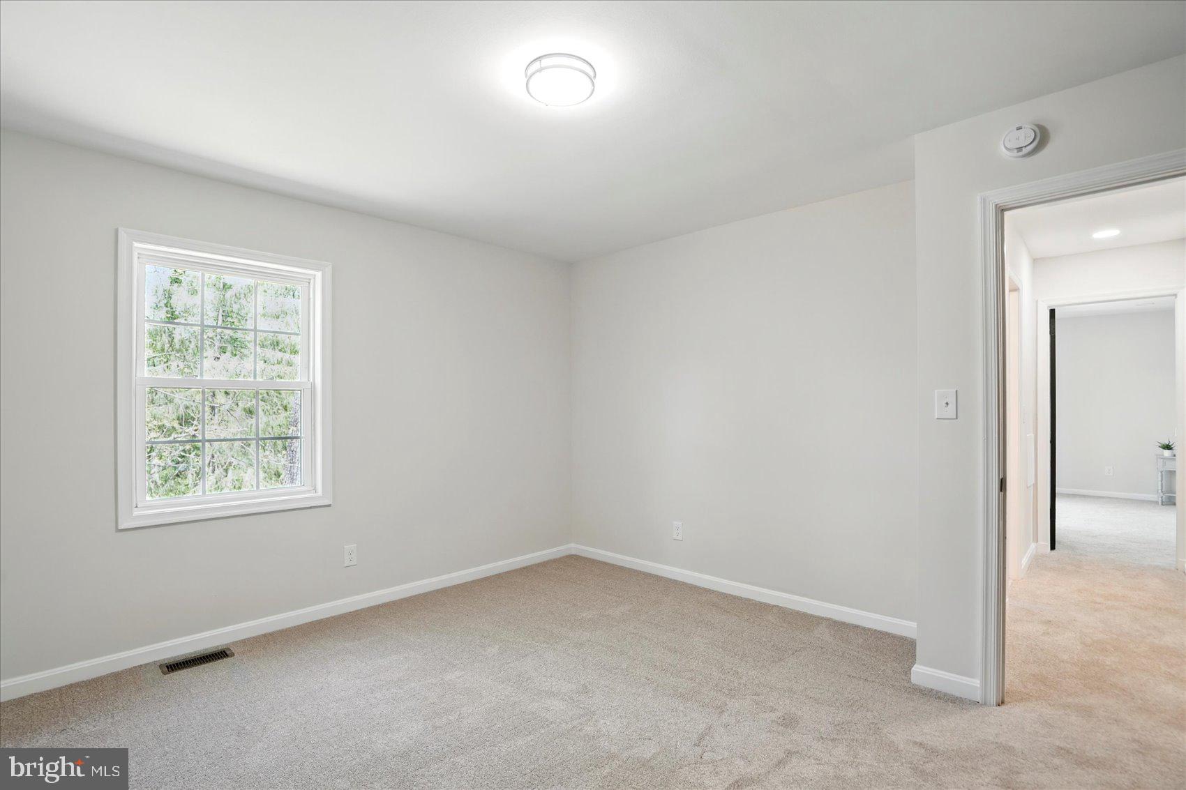 1504 Ameshire Road Lutherville-Timonium, MD 21093 - Photo 40 of 54 an empty room with a window