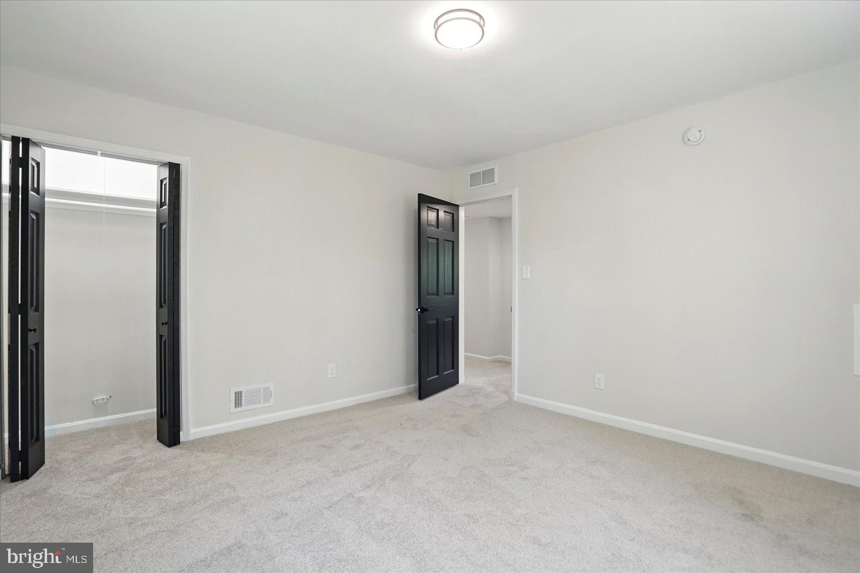 1504 Ameshire Road Lutherville-Timonium, MD 21093 - Photo 45 of 54 an empty room with an entryway