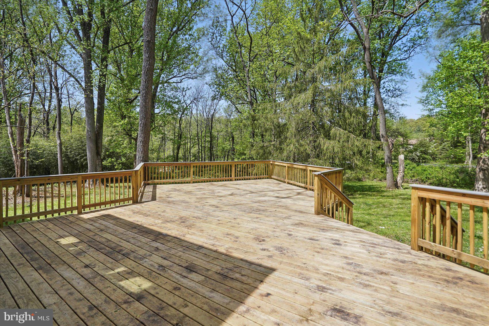 1504 Ameshire Road Lutherville-Timonium, MD 21093 - Photo 9 of 54 a view of balcony with wooden floor and fence
