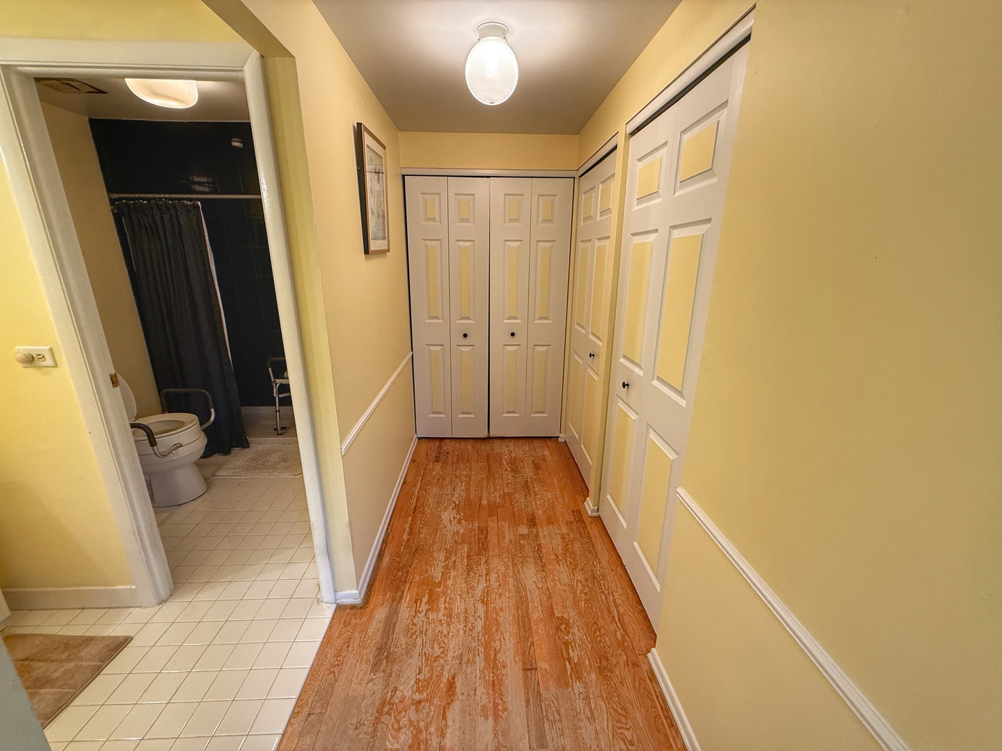 526 Springinsguth Road Schaumburg, IL 60193 - Photo 15 of 24 a view of a hallway with wooden floor and staircase