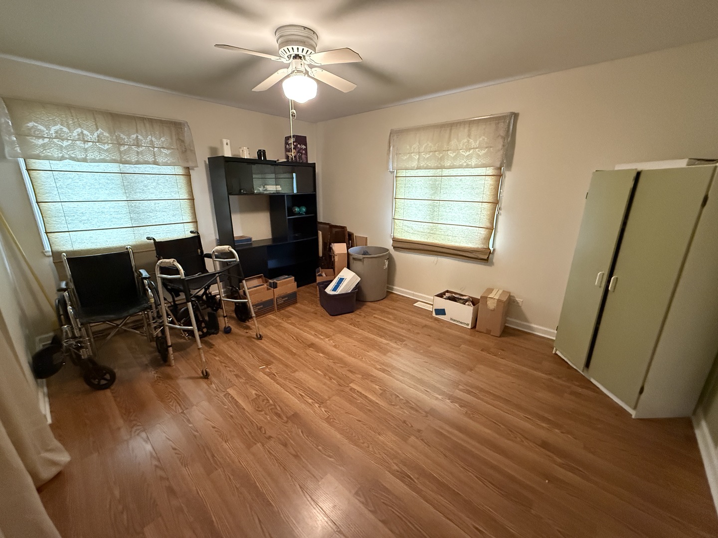 526 Springinsguth Road Schaumburg, IL 60193 - Photo 16 of 24 a room with wooden floor and furniture