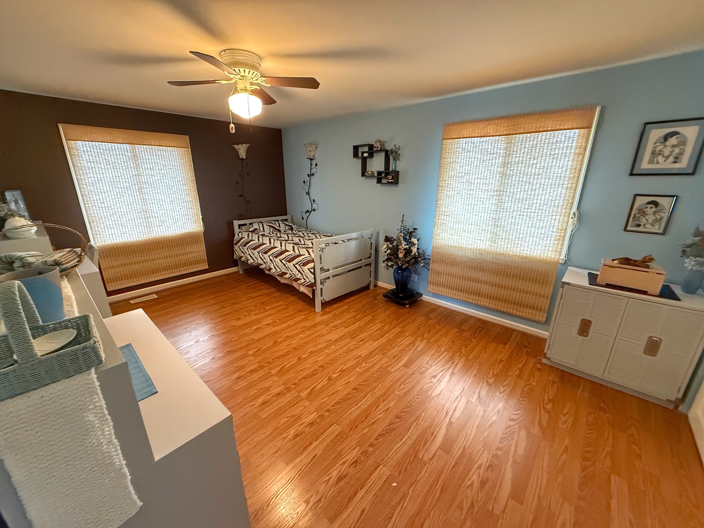 526 Springinsguth Road Schaumburg, IL 60193 - Photo 17 of 24 a bedroom with a bed and a window