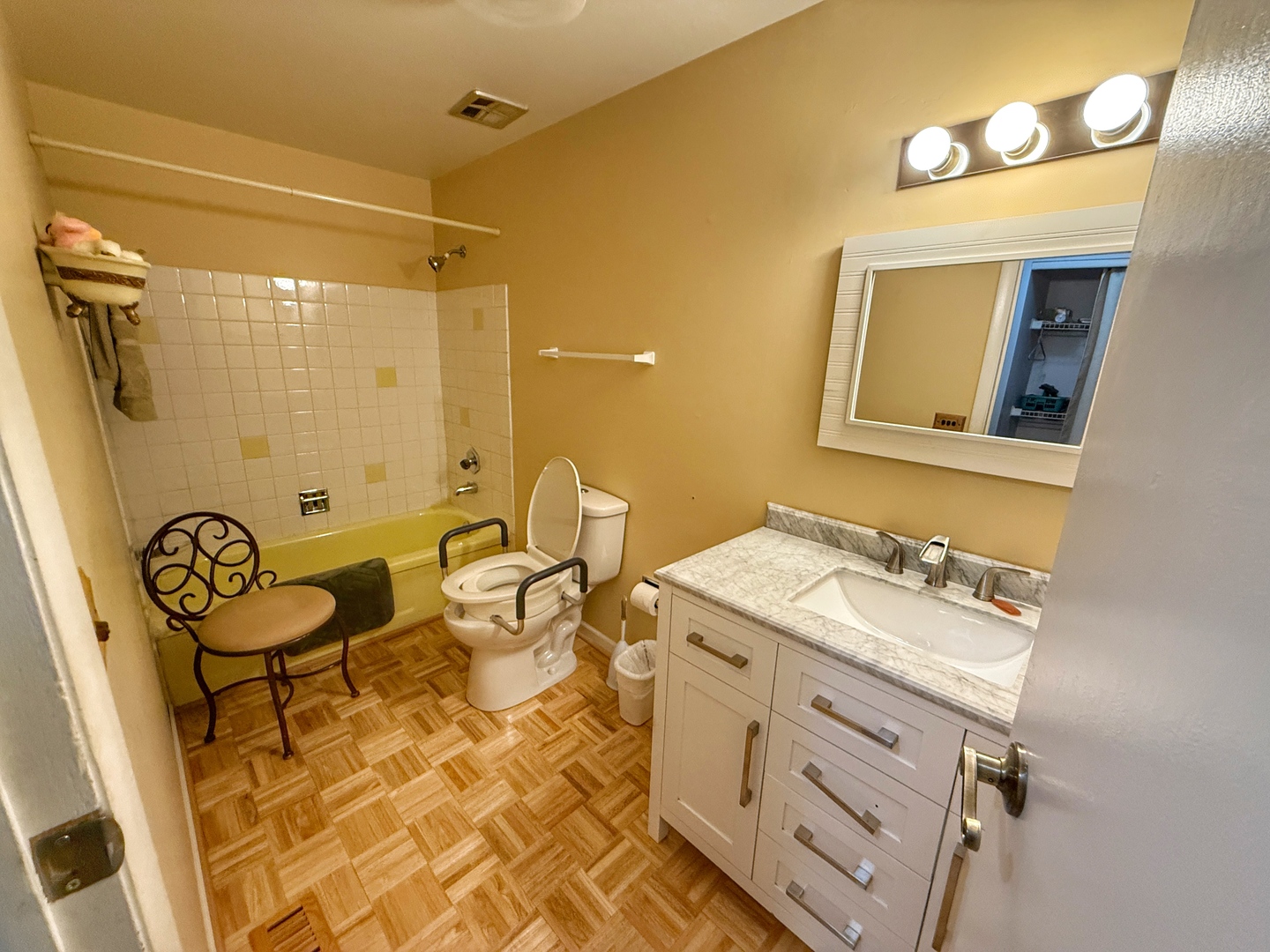 526 Springinsguth Road Schaumburg, IL 60193 - Photo 19 of 24 a bathroom with a sink and a mirror