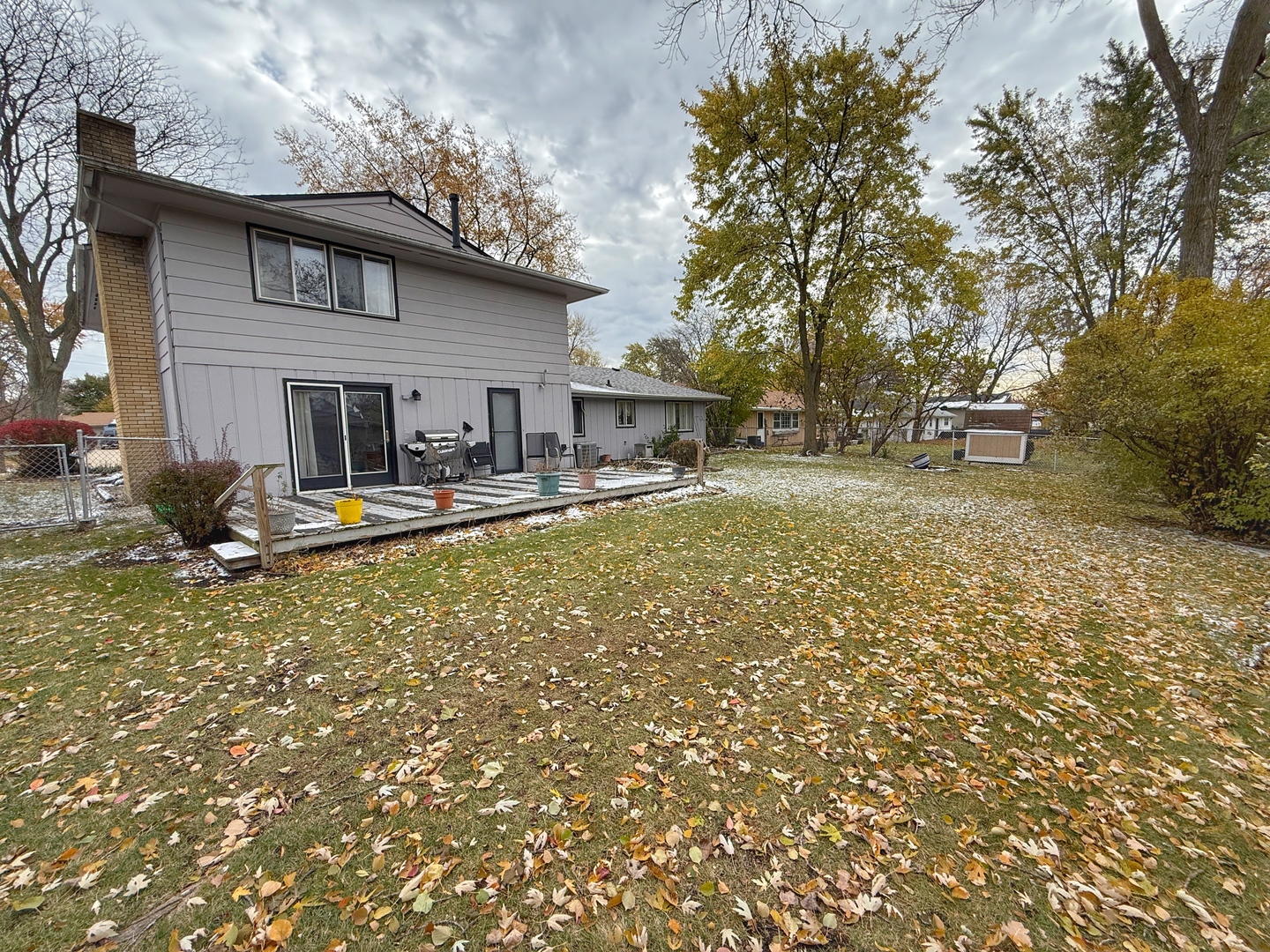 526 Springinsguth Road Schaumburg, IL 60193 - Photo 21 of 24 a view of a house with backyard and trees