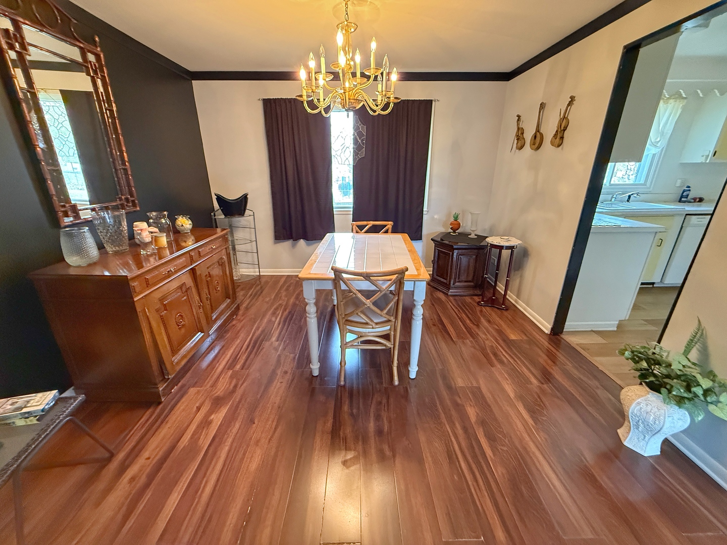 526 Springinsguth Road Schaumburg, IL 60193 - Photo 5 of 24 a view of a dining room with furniture window and wooden floor