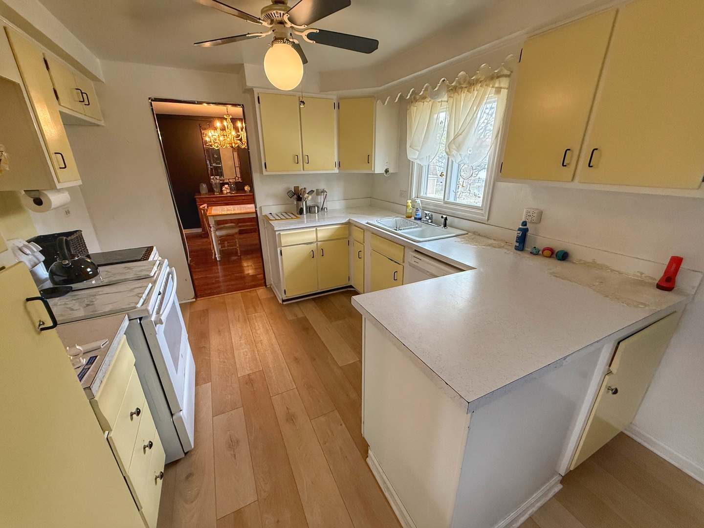 526 Springinsguth Road Schaumburg, IL 60193 - Photo 6 of 24 a kitchen with a sink appliances and cabinets
