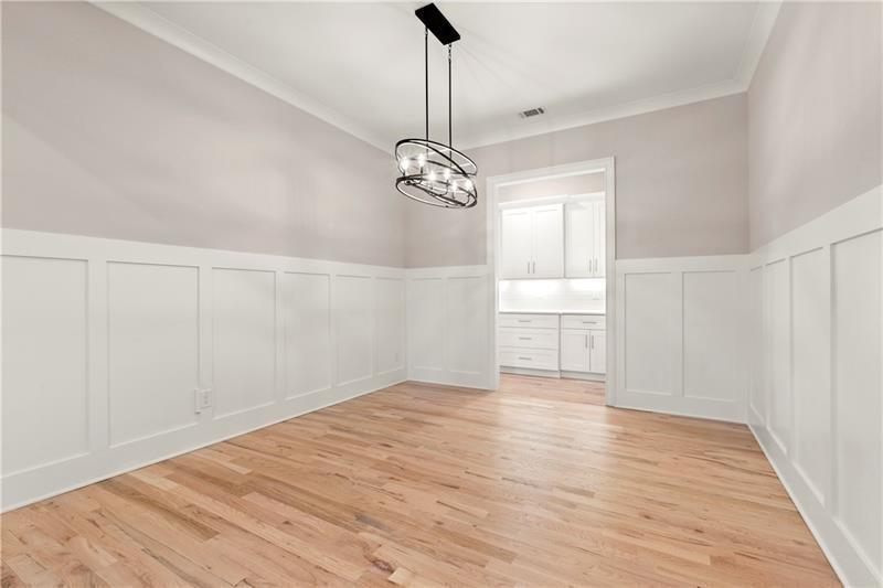 222 Trecastle Square, Unit 21 Canton, GA 30114 - Photo 15 of 45 a view of empty room with wooden floor and ceiling fan