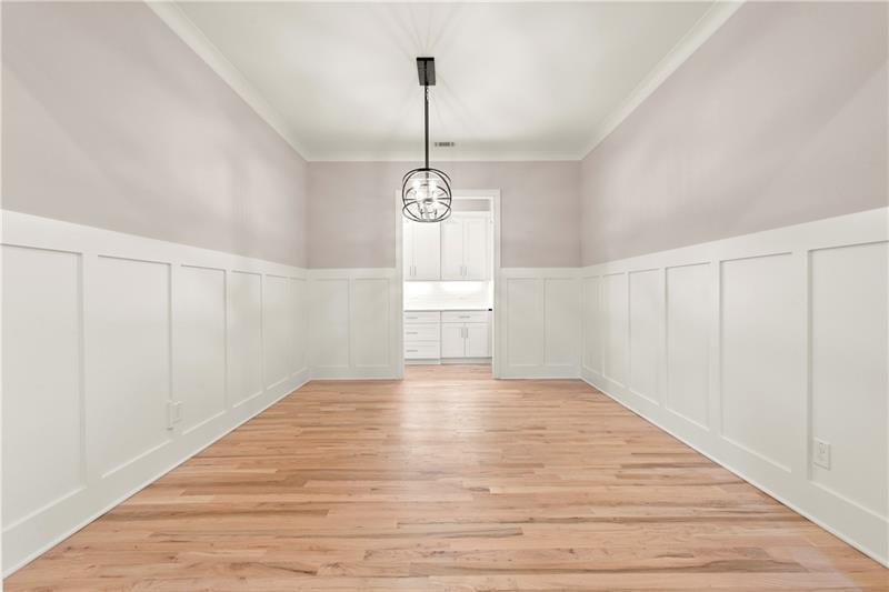 222 Trecastle Square, Unit 21 Canton, GA 30114 - Photo 16 of 45 a view of an empty room with wooden floor and window