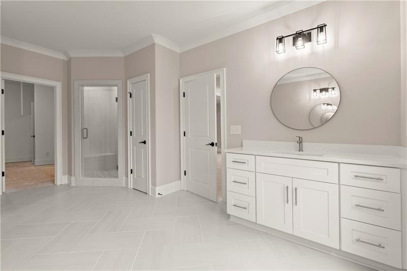 222 Trecastle Square, Unit 21 Canton, GA 30114 - Photo 26 of 45 a bathroom with a sink a light fixture and a mirror