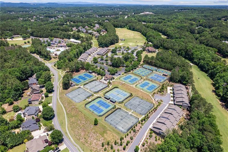 222 Trecastle Square, Unit 21 Canton, GA 30114 - Photo 41 of 45 an aerial view of a residential apartment building with swimming pool and mountain view
