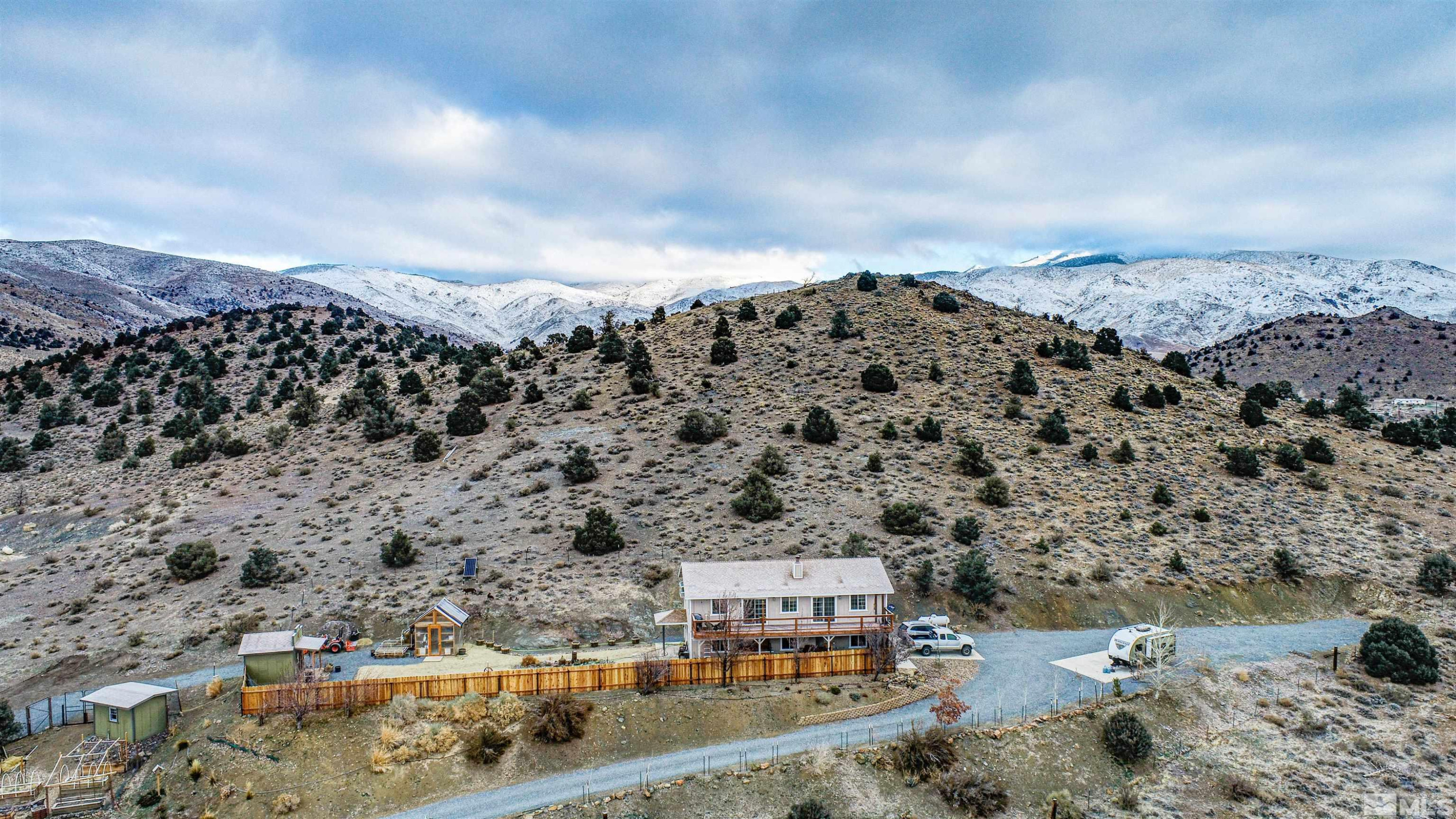 1471 Breccia Road Wellington, NV 89444 - Photo 4 of 15 a view of building with mountain view