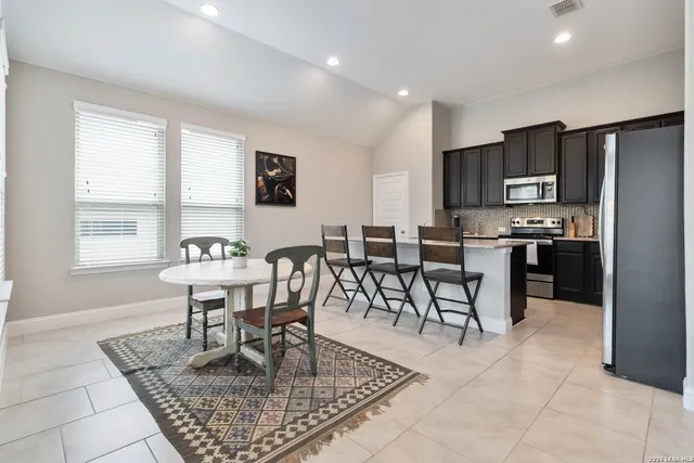 a view of a dining room with furniture