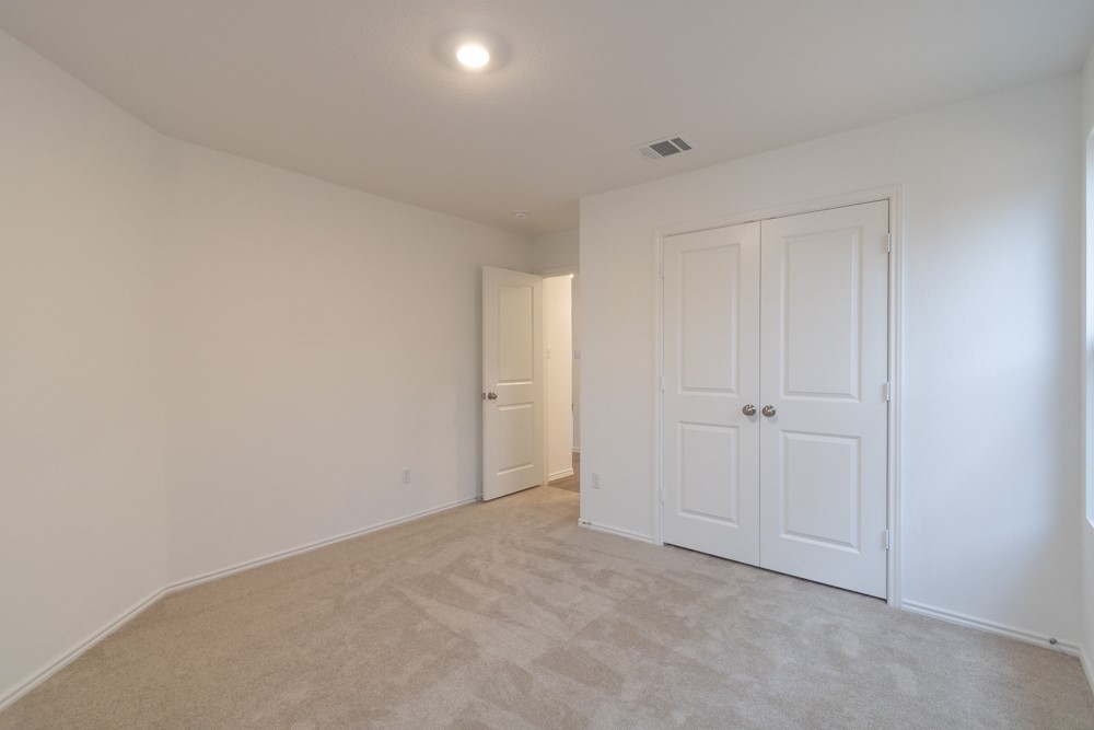 309 Canley Loop Hutto, TX 78634 - Photo 12 of 27 a view of an empty room