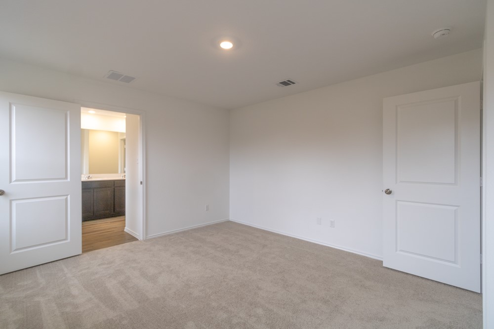 309 Canley Loop Hutto, TX 78634 - Photo 17 of 27 a view of an empty room and closet area