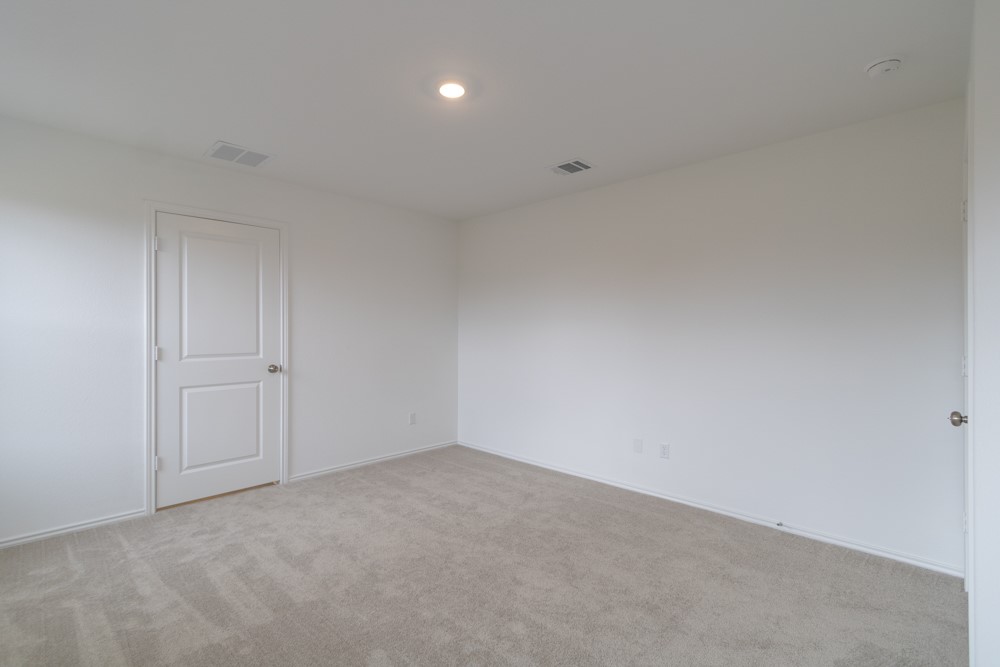 309 Canley Loop Hutto, TX 78634 - Photo 18 of 27 a view of an empty room