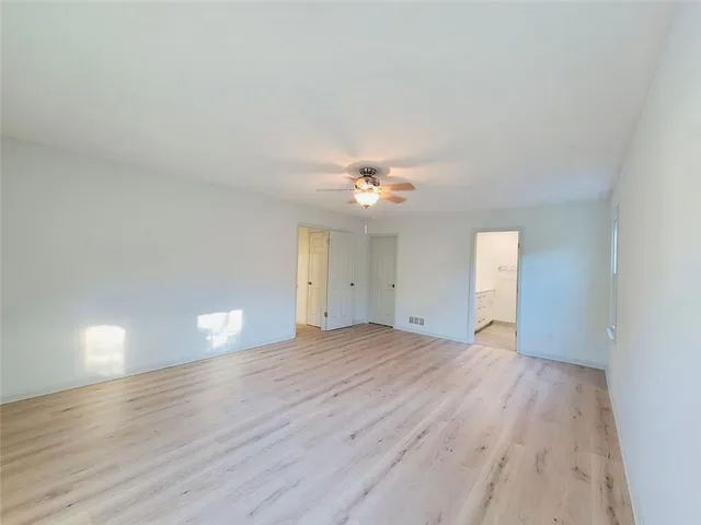 a bathroom with a double vanity sink and mirror