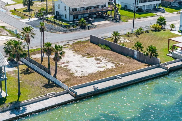a view of swimming pool with a patio