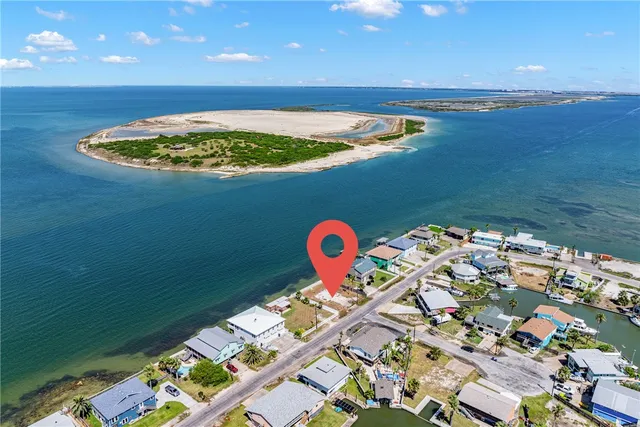 an aerial view of a house with a garden