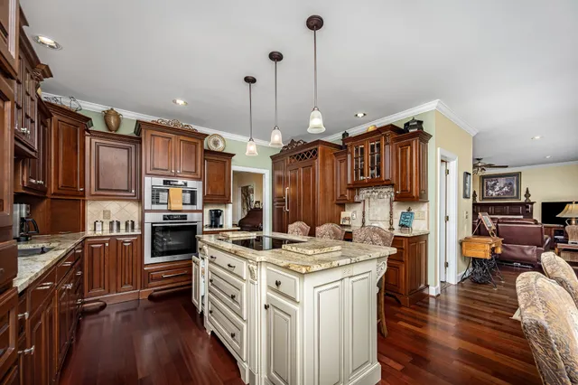 a bathroom with a sink vanity and mirror