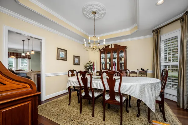 a living room with furniture fireplace and flat screen tv