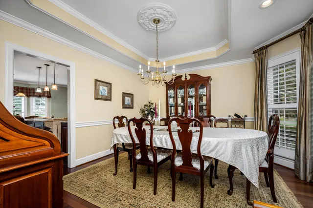 a living room with furniture fireplace and flat screen tv