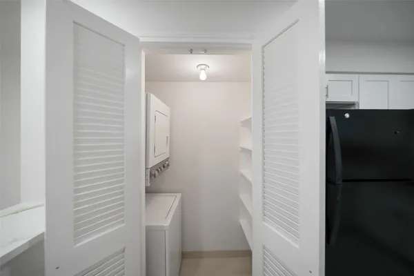 a bathroom with a shower and a sink