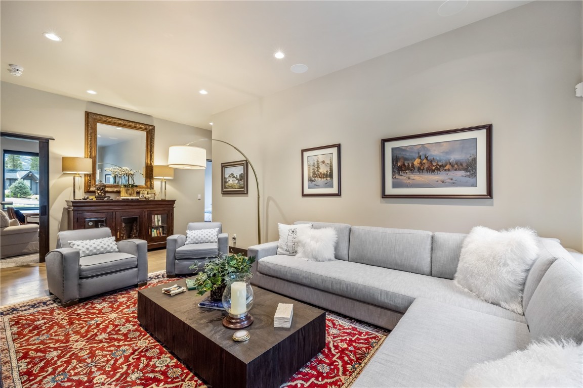 380 River Park Drive Breckenridge, CO 80424 - Photo 18 of 45 a living room with furniture potted plant and a rug