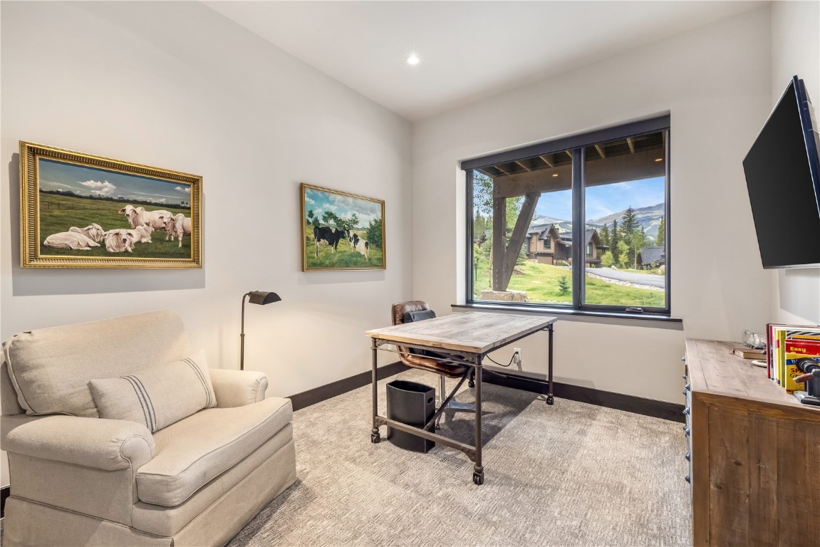 380 River Park Drive Breckenridge, CO 80424 - Photo 19 of 45 a living room with furniture and a flat screen tv