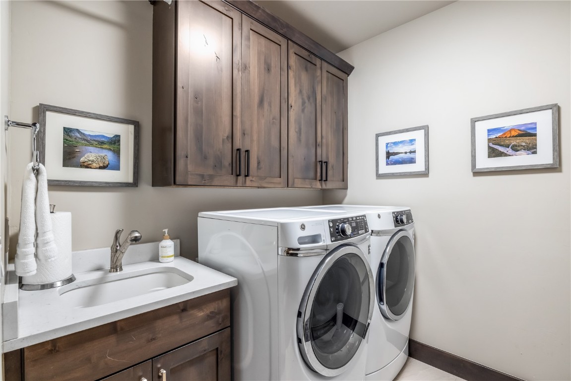 380 River Park Drive Breckenridge, CO 80424 - Photo 24 of 45 a utility room with dryer and washer