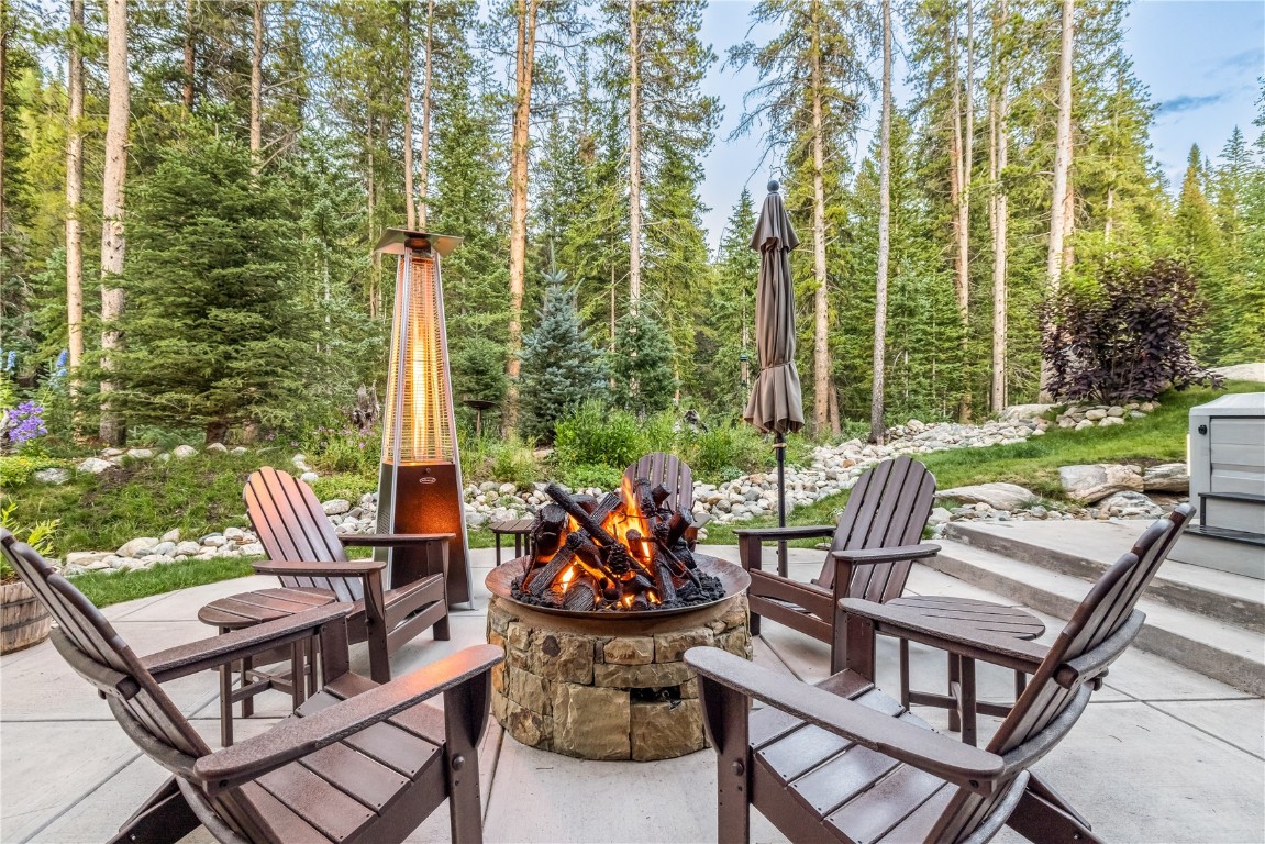 380 River Park Drive Breckenridge, CO 80424 - Photo 28 of 45 a view of a patio with a table chairs and a patio
