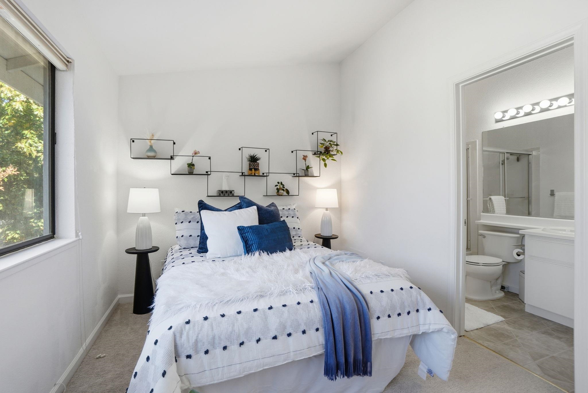 2586 Oak Road, Unit 229 Walnut Creek, CA 94597 - Photo 13 of 39 a bedroom with a bed and window