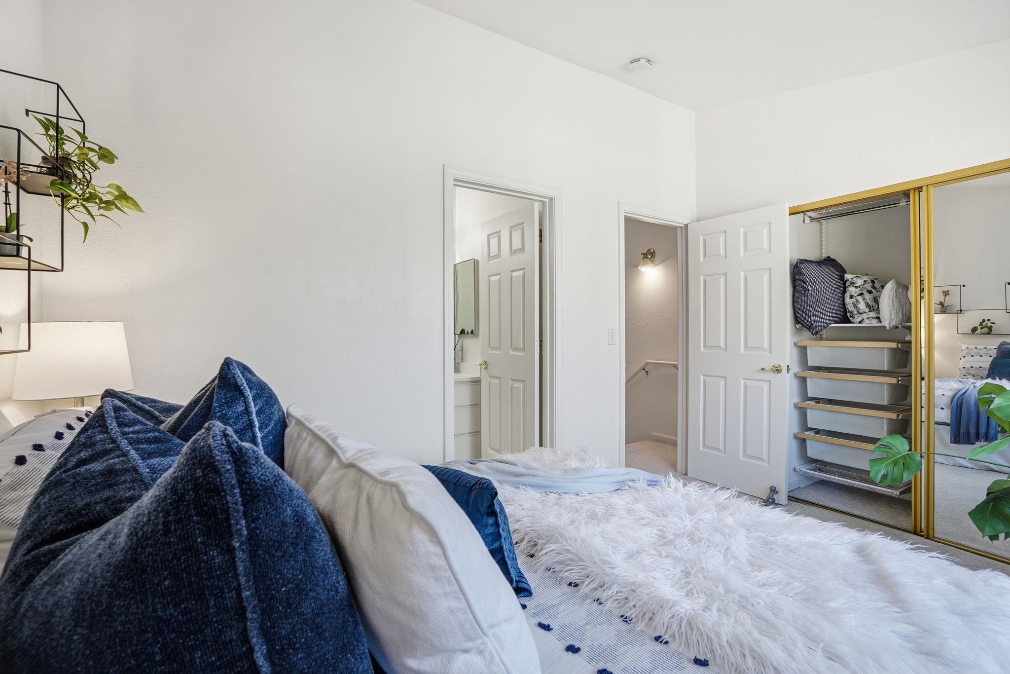 2586 Oak Road, Unit 229 Walnut Creek, CA 94597 - Photo 14 of 39 a bed room with a bed and a plant