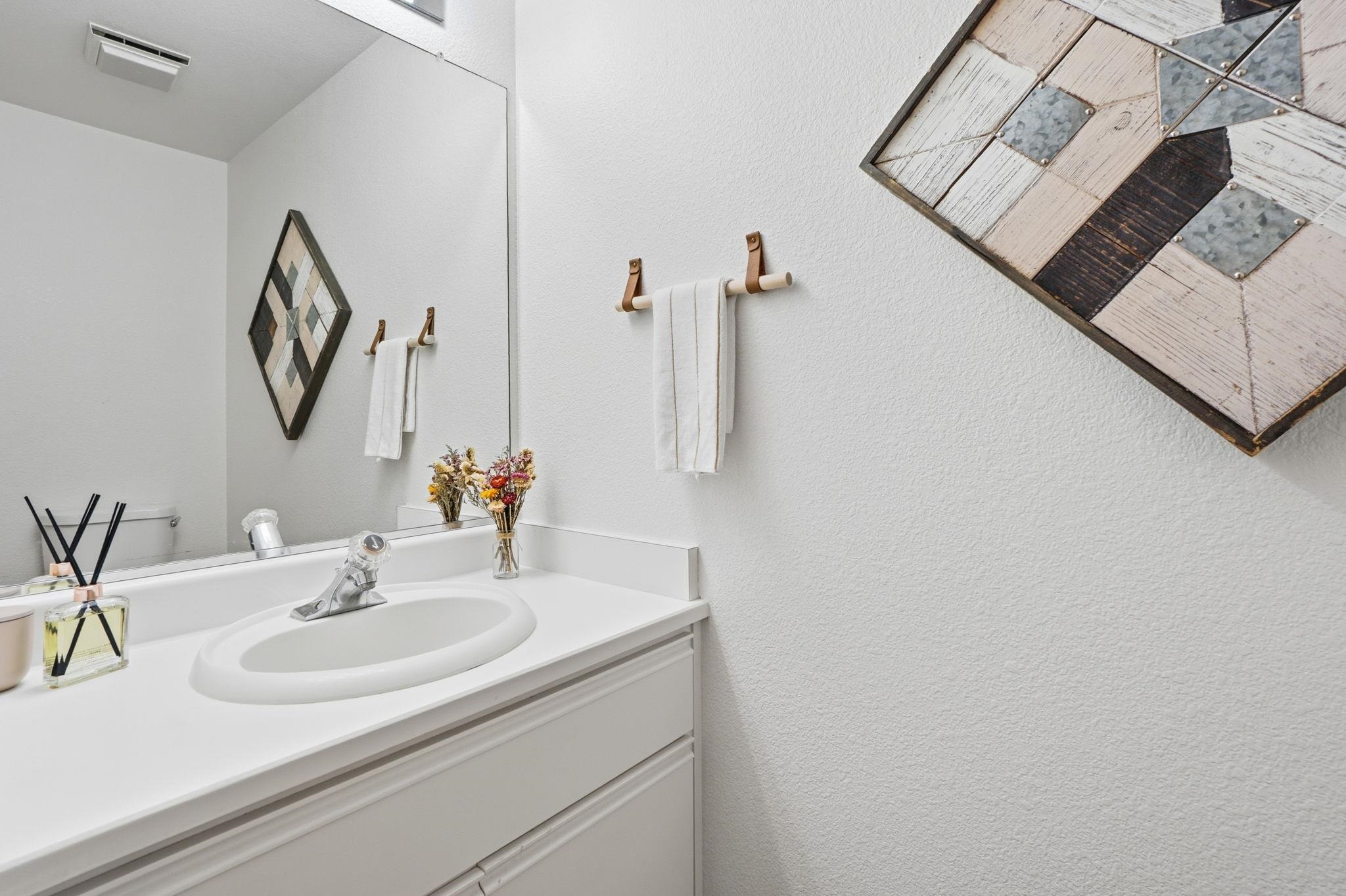 2586 Oak Road, Unit 229 Walnut Creek, CA 94597 - Photo 20 of 39 a bathroom with a sink and a mirror