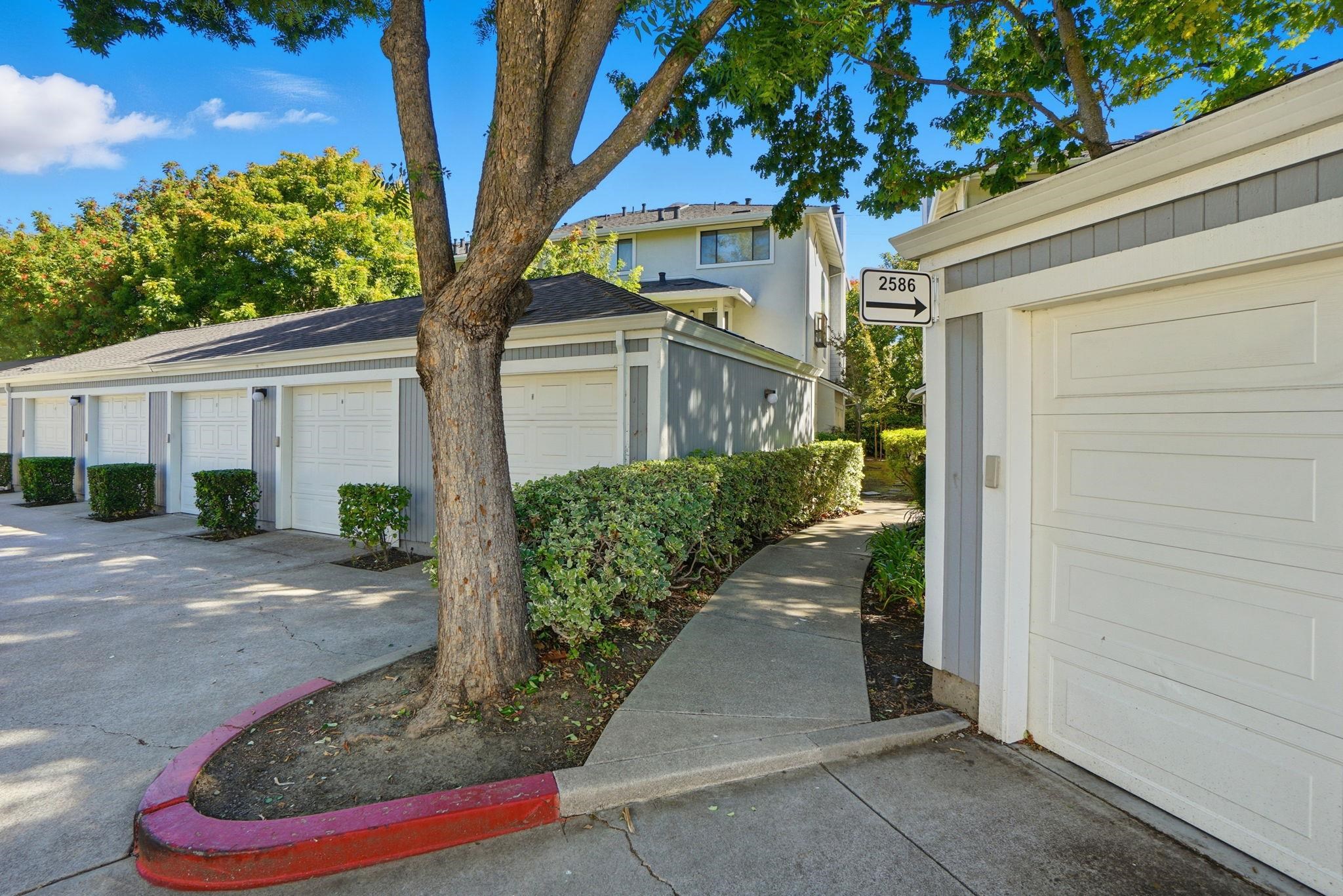 2586 Oak Road, Unit 229 Walnut Creek, CA 94597 - Photo 34 of 39 a front view of a house with garden