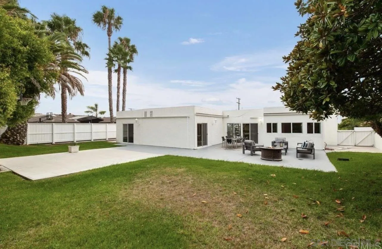 5957 Avenida Chamnez La Jolla, CA 92037 - Photo 24 of 28 a view of a house with swimming pool and sitting area