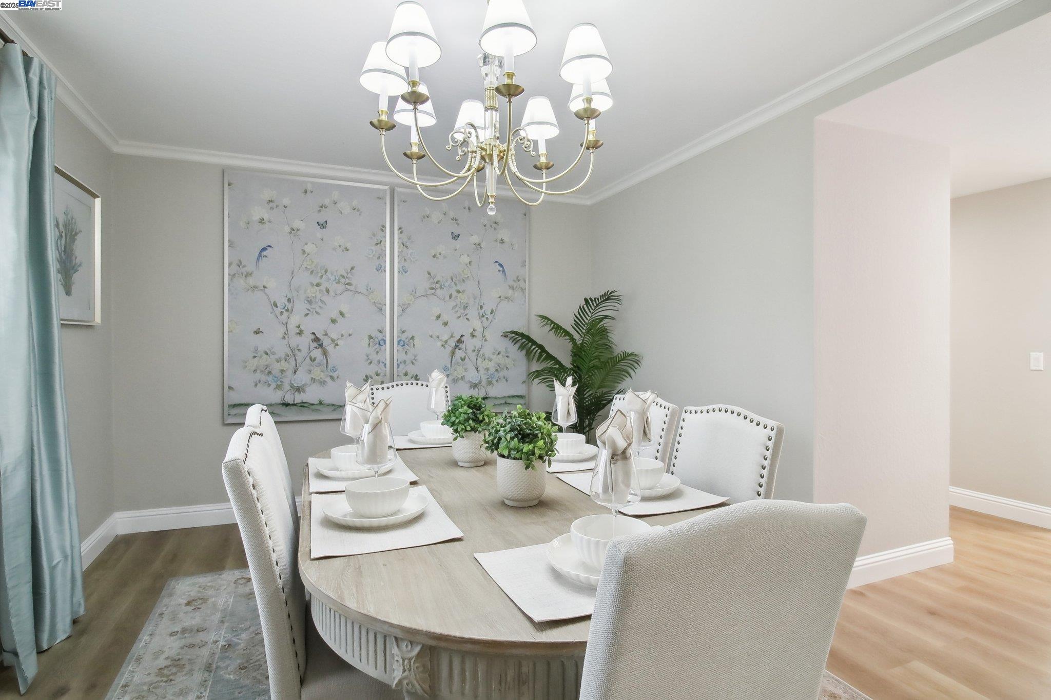484 El Pintado Road Danville, CA 94526 - Photo 27 of 60 a dining room with furniture a chandelier and wooden floor