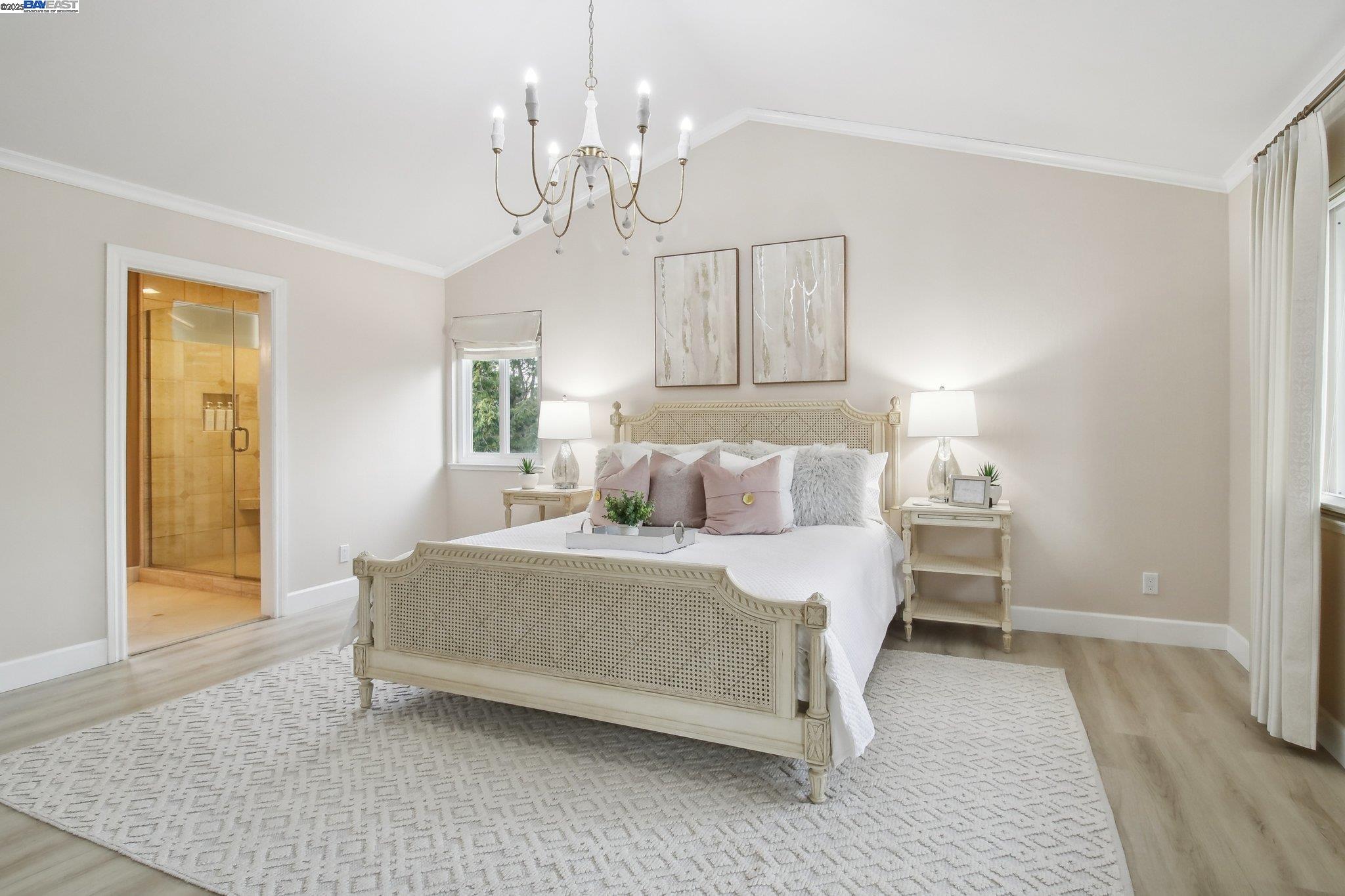 484 El Pintado Road Danville, CA 94526 - Photo 34 of 60 a spacious bedroom with a bed chandelier and a window