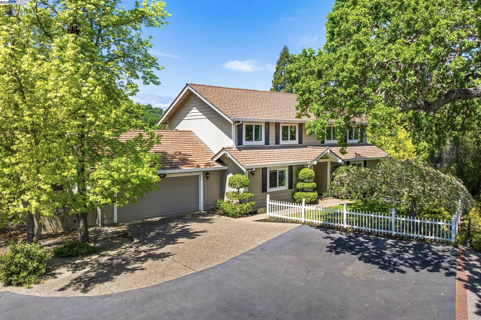484 El Pintado Road Danville, CA 94526 - Photo 7 of 60 a view of a house with a yard and large tree