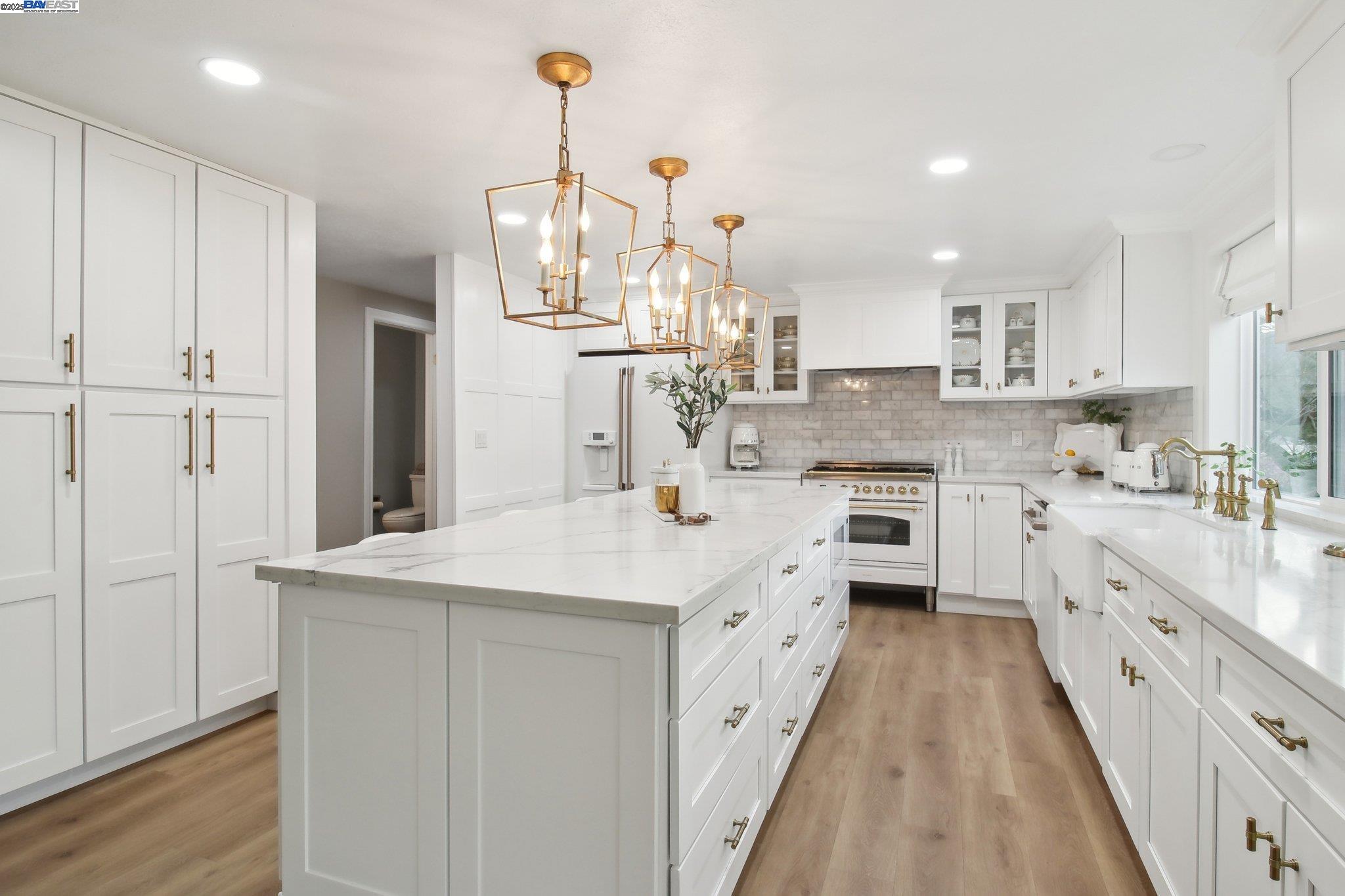 484 El Pintado Road Danville, CA 94526 - Photo 10 of 60 a kitchen with kitchen island granite countertop appliances cabinets and a sink